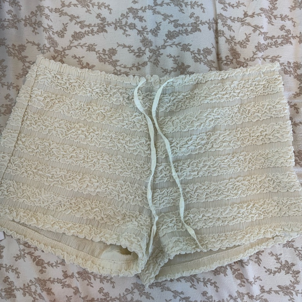 Lioness mini white ruffle shorts